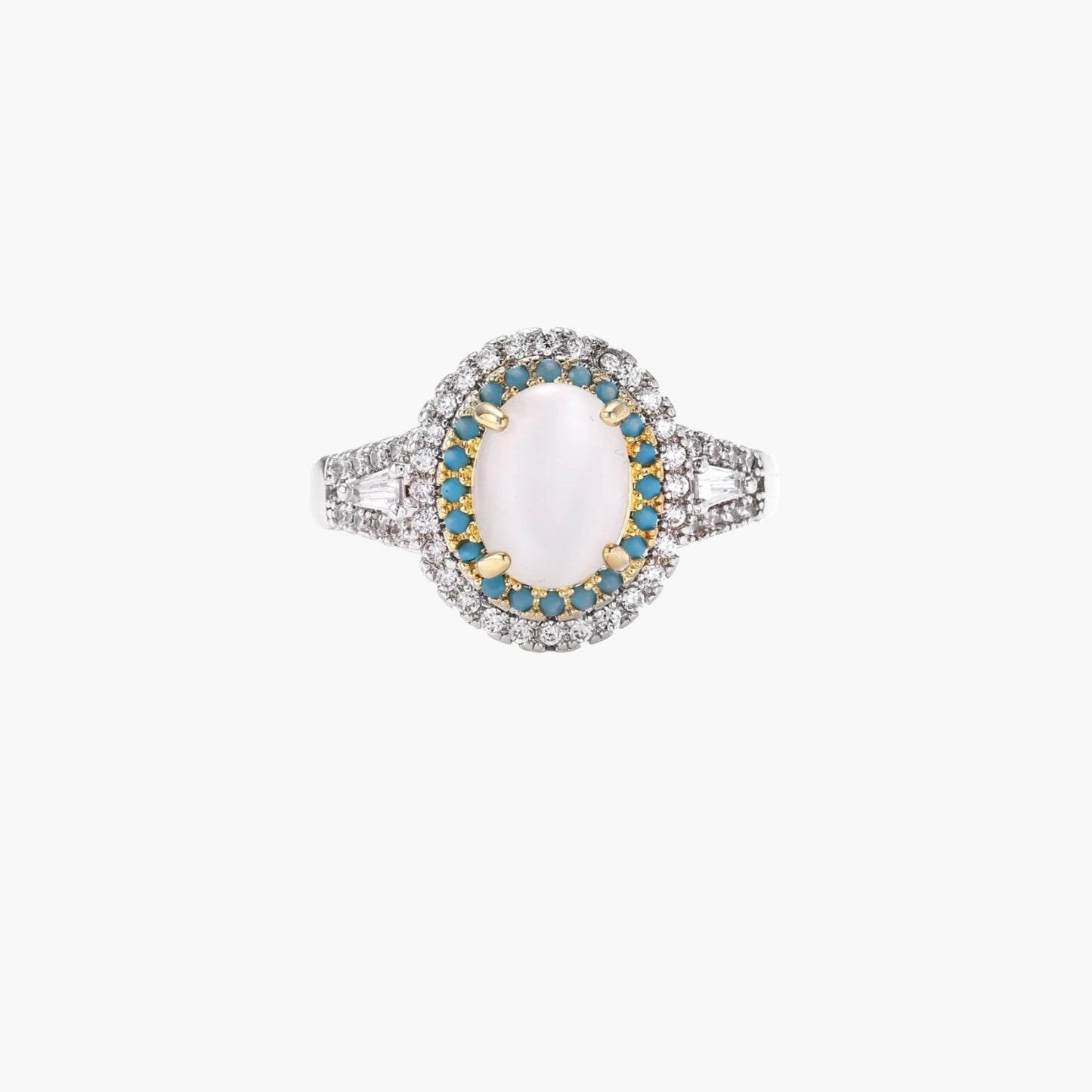 Vintage-style cocktail ring with luminous cat's eye center stone surrounded by turquoise and crystal double halo on white gold plated band